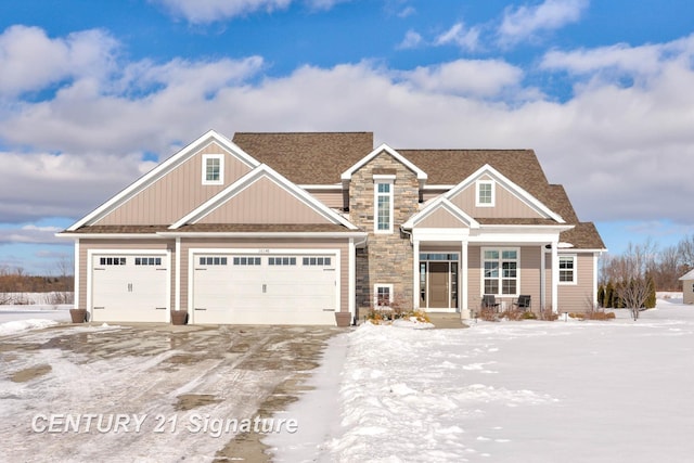 craftsman house with a garage