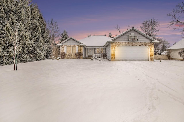 single story home featuring a garage