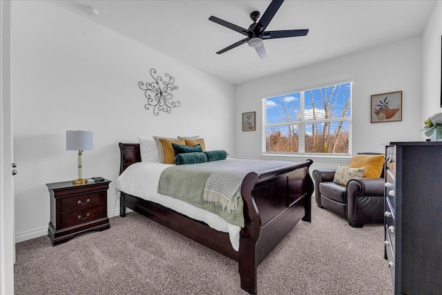 bedroom with ceiling fan and light colored carpet