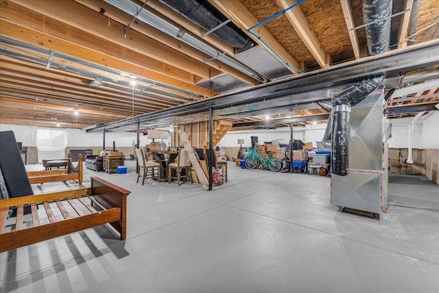 basement featuring heating unit