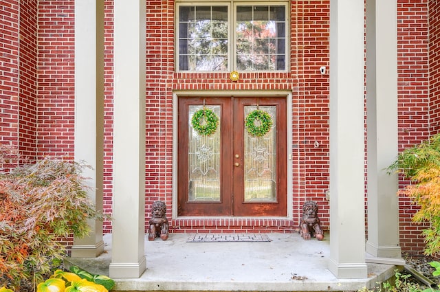 entrance to property featuring french doors