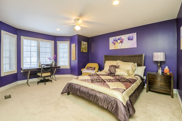 bedroom with ceiling fan and carpet flooring