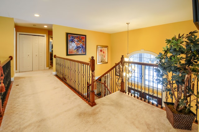 interior space with carpet flooring and a chandelier