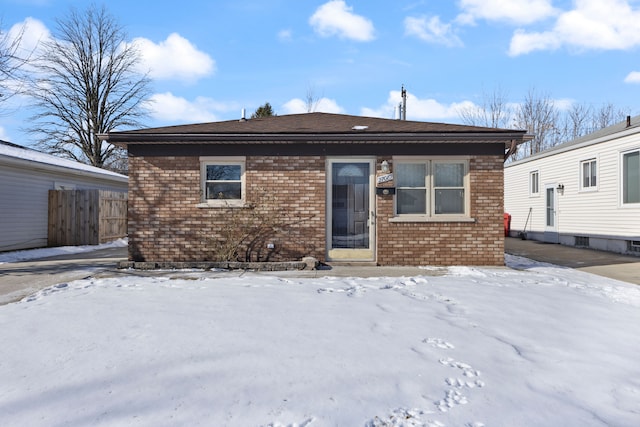 view of snow covered house