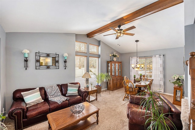 carpeted living room featuring ceiling fan with notable chandelier, vaulted ceiling with beams, and a wealth of natural light