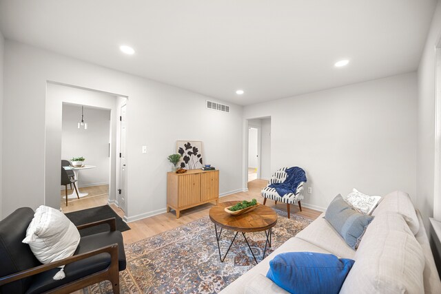 living room with wood-type flooring