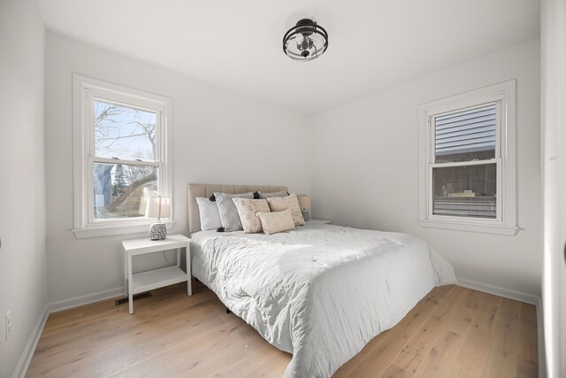 bedroom featuring light hardwood / wood-style flooring