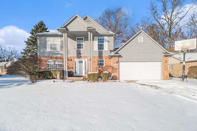 view of front of property with a garage and central AC