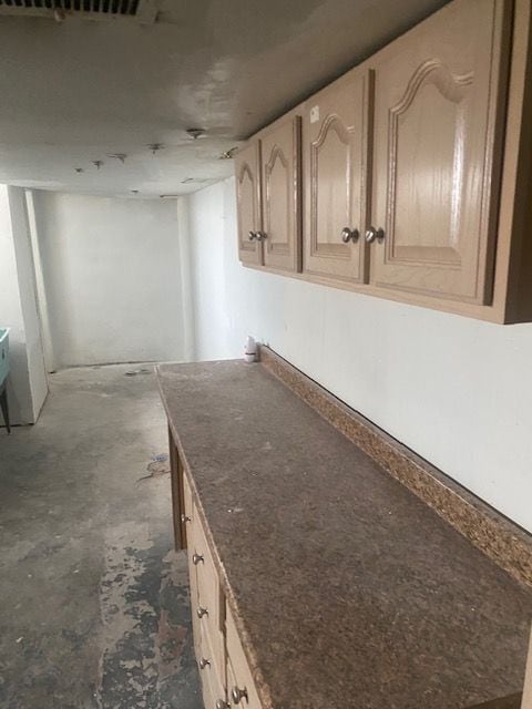 kitchen featuring light brown cabinets