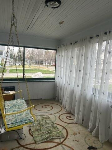 sunroom featuring plenty of natural light