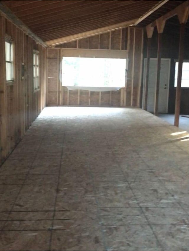 interior space featuring lofted ceiling