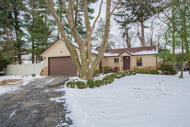 single story home featuring a garage