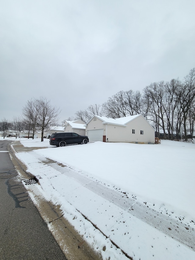 exterior space with a garage