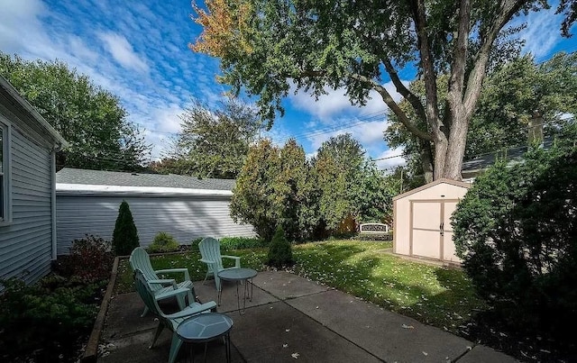 view of patio / terrace with a shed