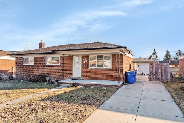 bungalow with a front yard