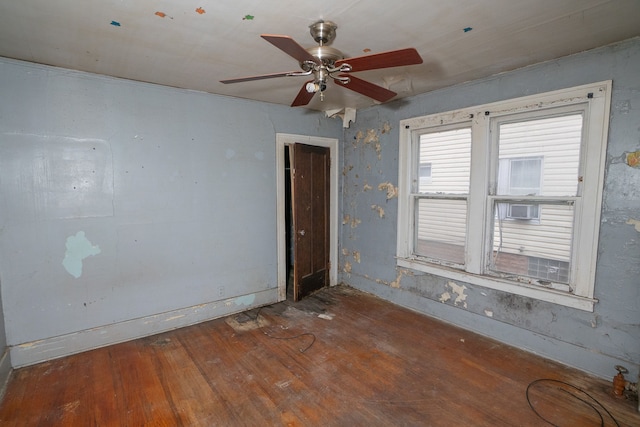 spare room featuring ceiling fan and wood-type flooring