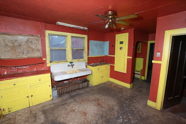 bathroom featuring sink and ceiling fan