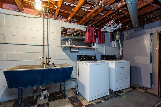 washroom with washing machine and clothes dryer