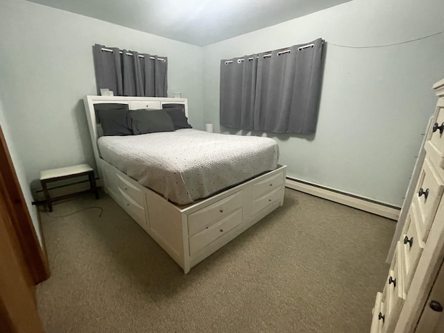 bedroom featuring baseboard heating and light colored carpet