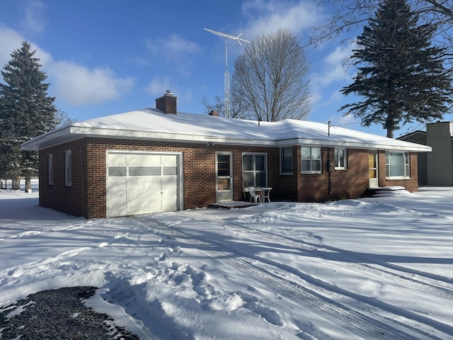 single story home with a garage