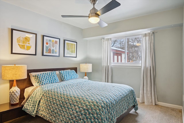 carpeted bedroom featuring ceiling fan