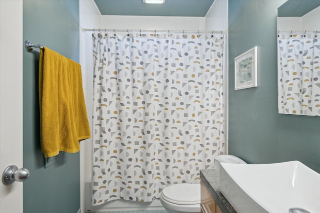 full bathroom with vanity, shower / bath combo with shower curtain, and toilet