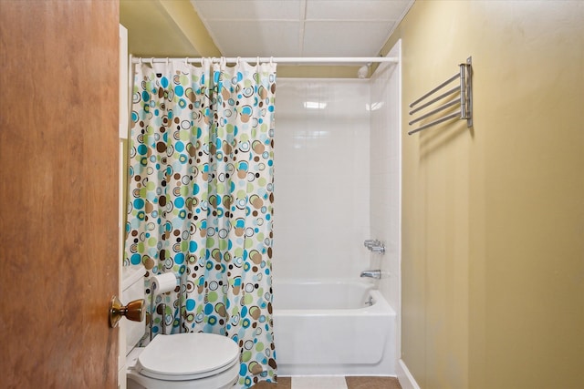 bathroom with shower / bathtub combination with curtain and toilet