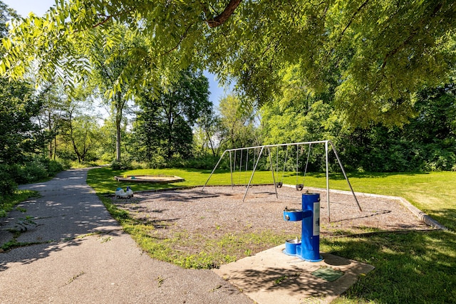 view of playground featuring a yard