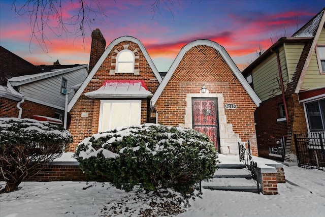 view of tudor-style house