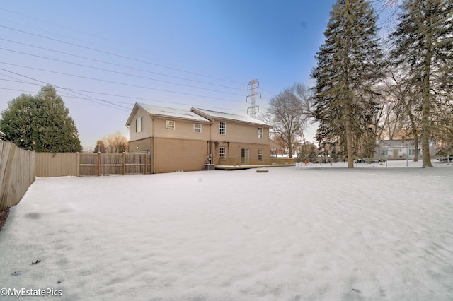 view of yard covered in snow