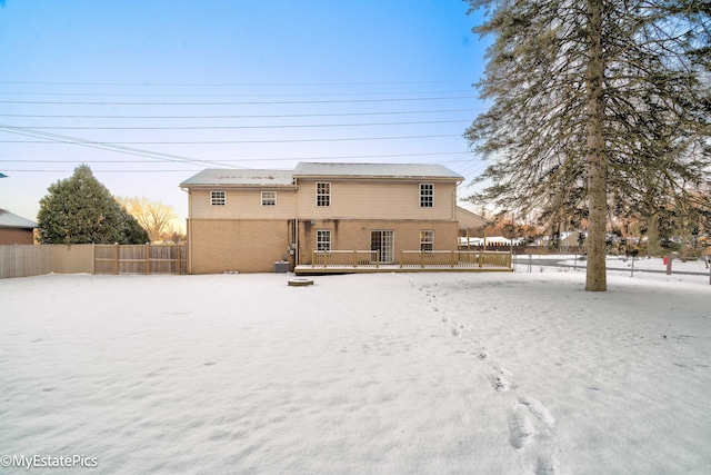 view of snow covered property