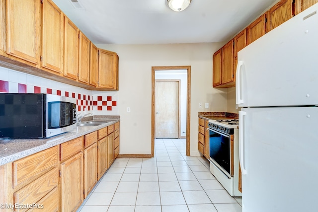 kitchen featuring light tile patterned flooring, sink, tasteful backsplash, and white appliances