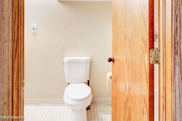 bathroom featuring tile patterned floors and toilet