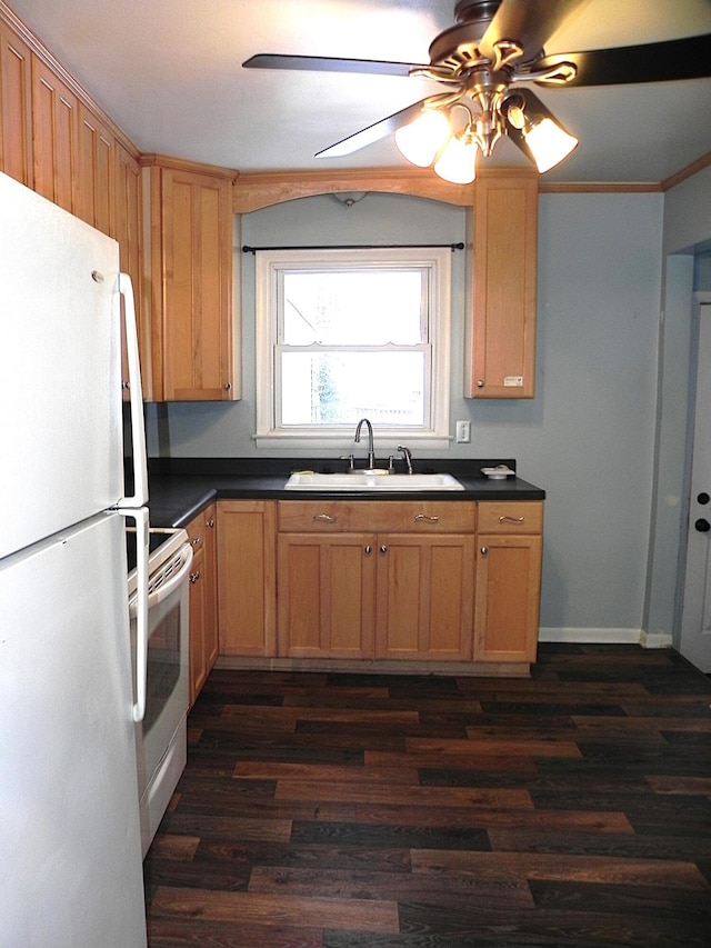 kitchen with white appliances, ceiling fan, sink, and dark wood-type flooring