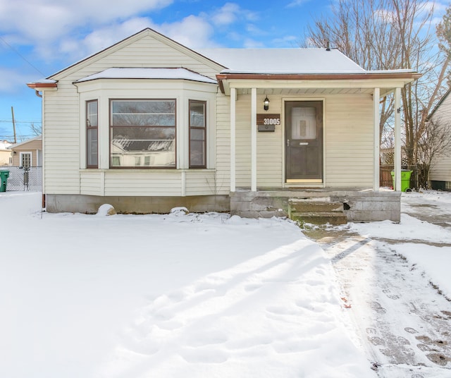 bungalow-style home with a porch