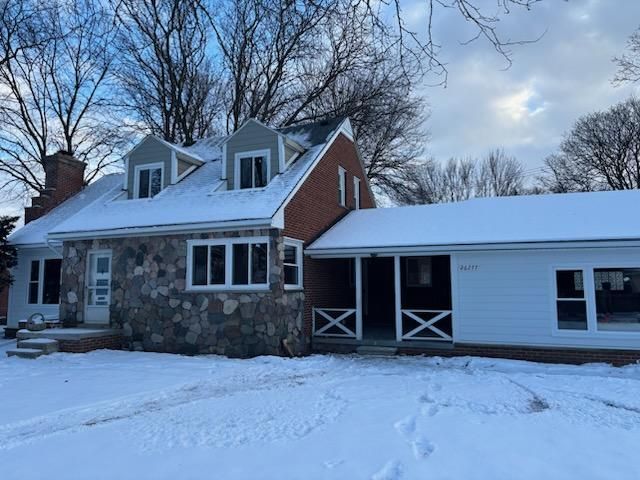 view of new england style home