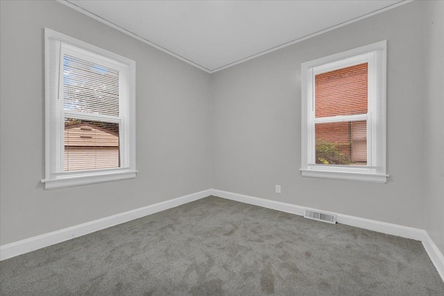 view of carpeted spare room