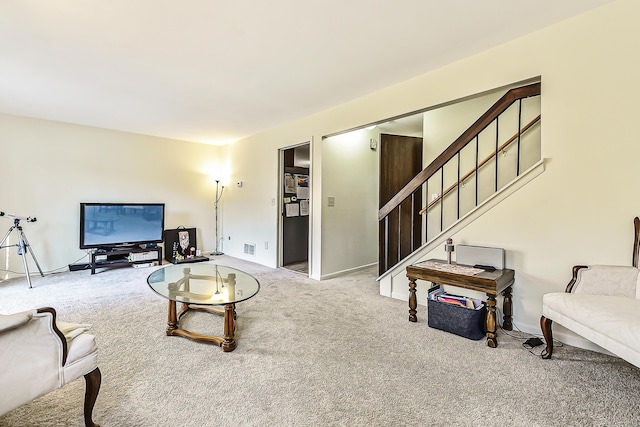 living room featuring carpet floors