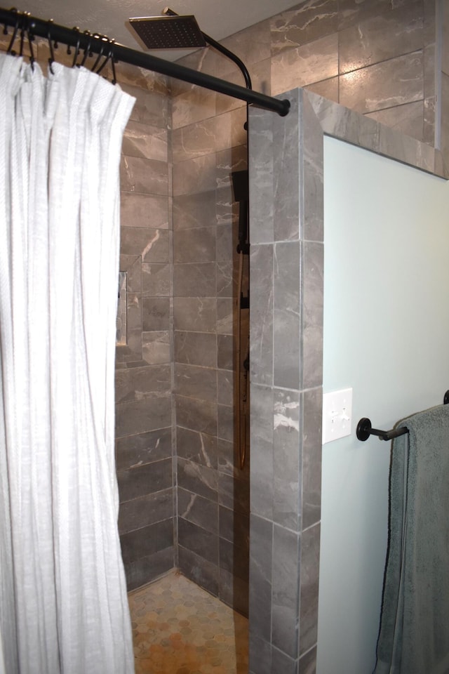 bathroom with a shower with curtain