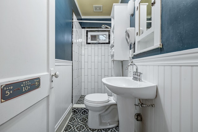 bathroom featuring tile patterned floors and toilet