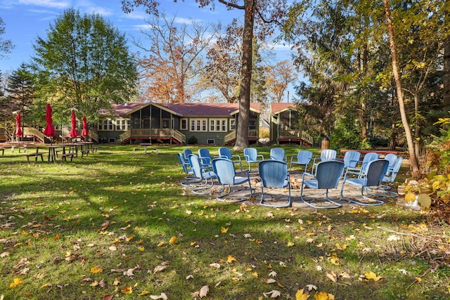 view of yard with a sunroom