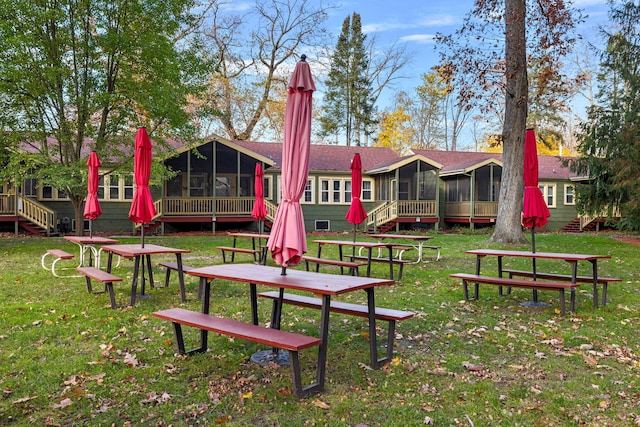 view of home's community featuring a yard