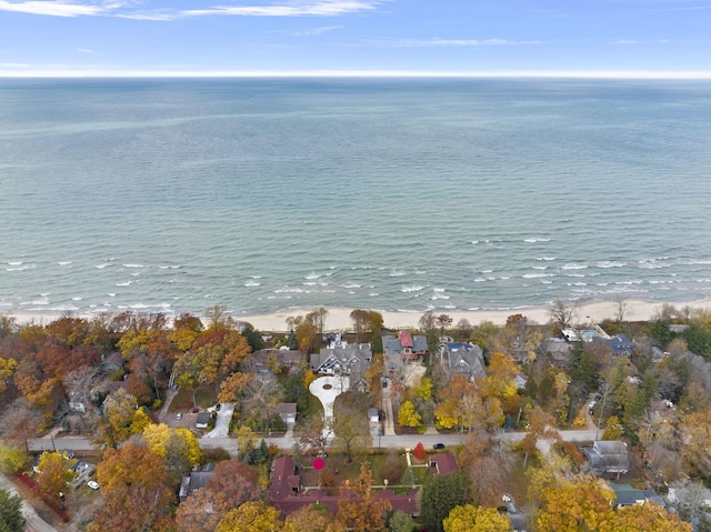 aerial view featuring a view of the beach and a water view