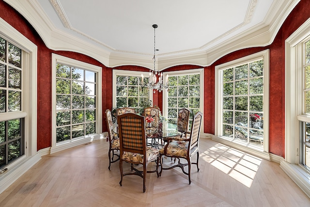 dining room featuring light wood-type flooring and a chandelier