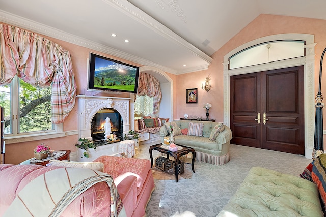 living room featuring light carpet, vaulted ceiling, and ornamental molding