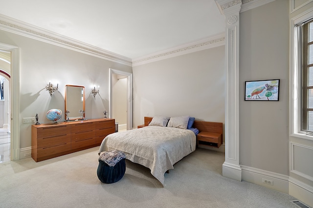 carpeted bedroom featuring multiple windows and ornamental molding