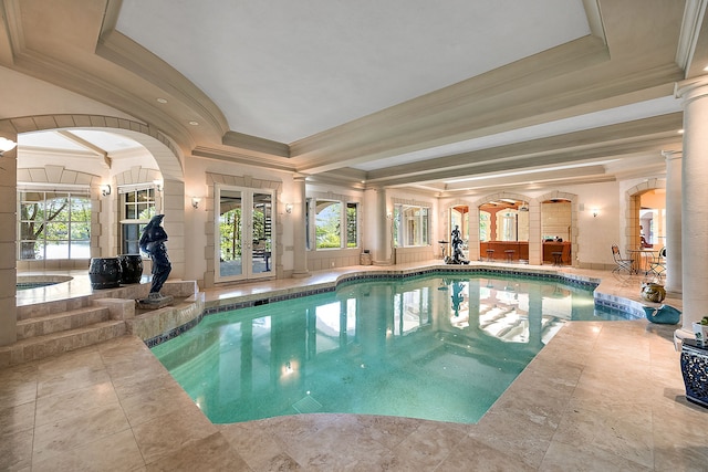 view of pool featuring french doors