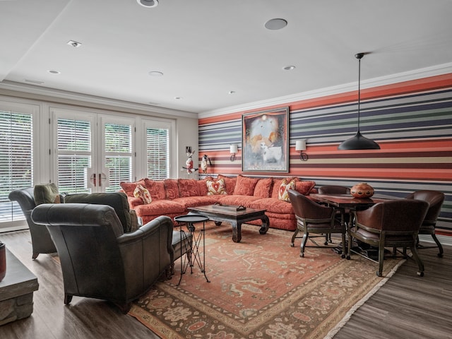 living room featuring crown molding and hardwood / wood-style floors