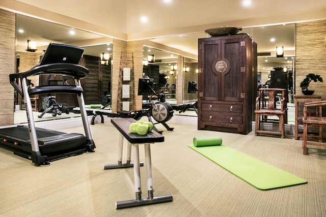 workout area with light colored carpet