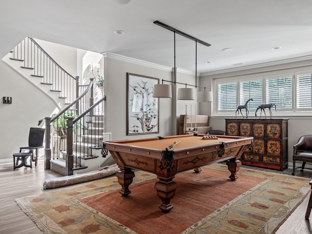 recreation room with pool table, light hardwood / wood-style floors, and crown molding